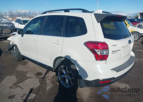 2016 Subaru Forester 2.5I Touring z USA, uszkodzony, nr VIN JF2SJAXC9GH453588